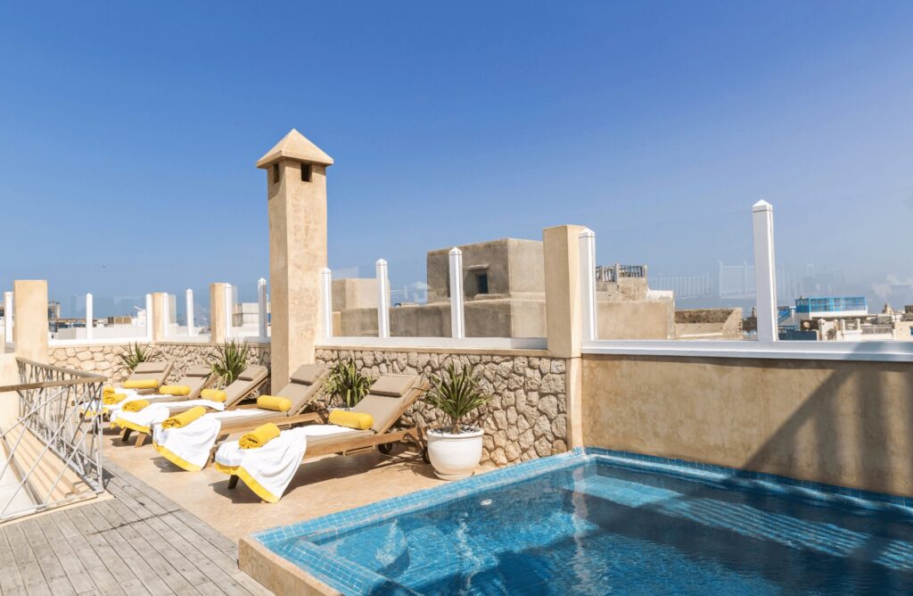 A plunge pool on the rooftop terrace of a luxury hotel in Essaouira