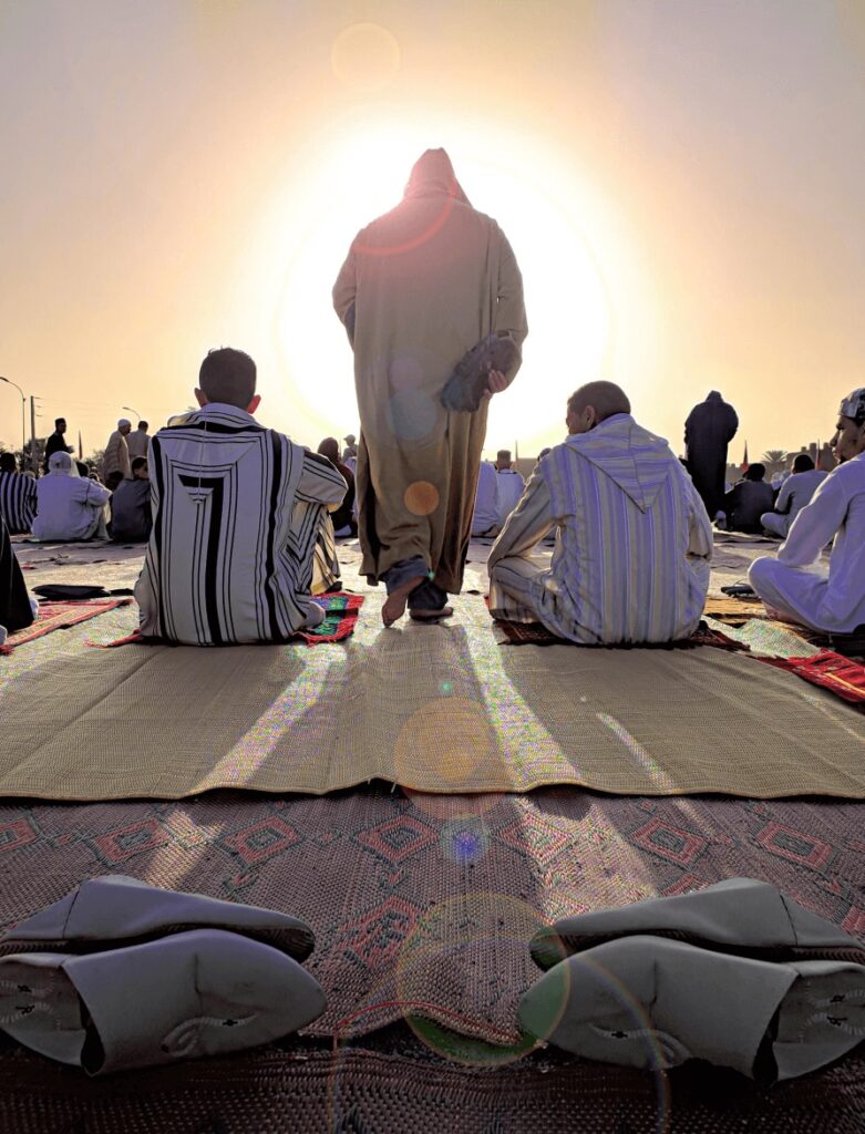 Is Taroudant worth visiting? Moroccan men preparing to pray outside in Taroudant
