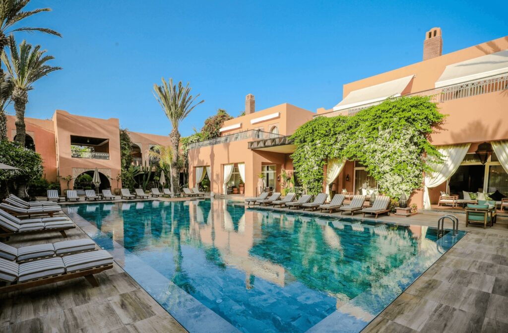 Sun loungers frame a swimming pool at the Tikida Golf Palace - one of the best hotels in Agadir 