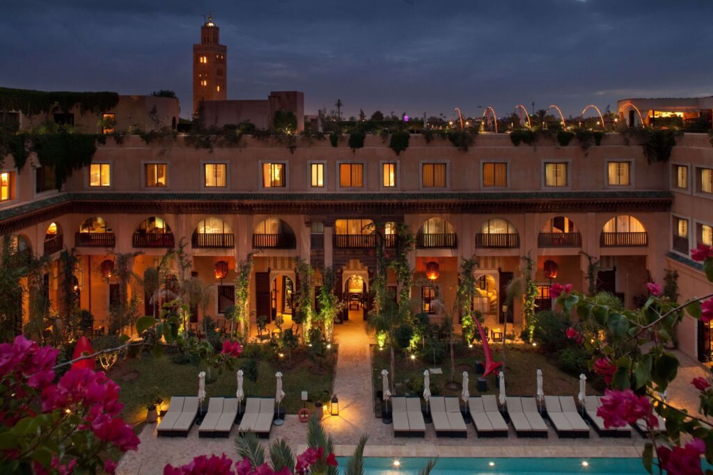 The minaret of Koutoubia Mosque rises above Les Jardins de la Koutoubia in Marrakech