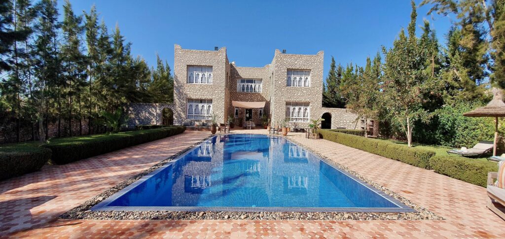 The stunning grounds of La Maison des Ailleurs, one of the best hotels near Essaouira Airport with a pool