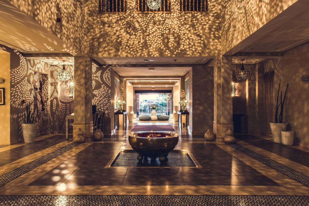 The stylish lobby of Paradis Plage Surf, Yoga & Spa - one of the best luxury hotels in Taghazout