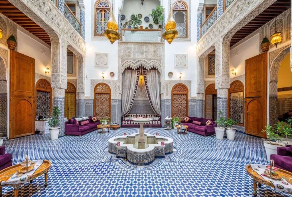 Inside the intricately decorated interior courtyard of one of the best family riads in Fes