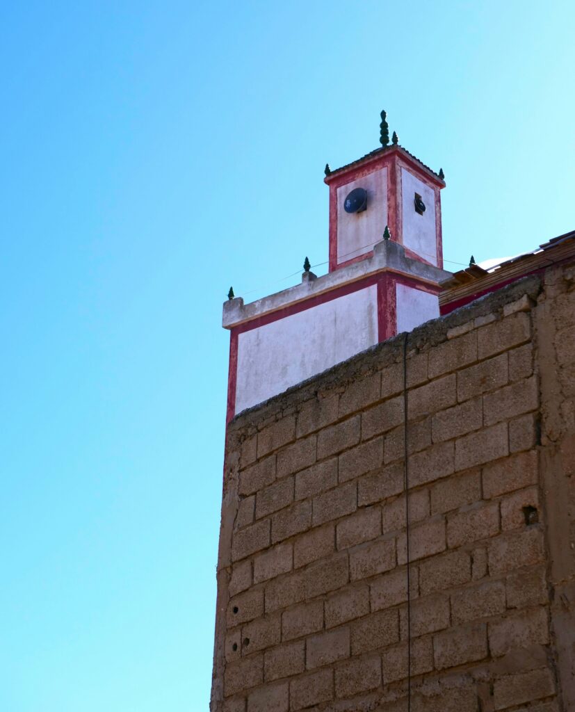 Travel guide to Safi, Morocco: A small minaret rises atop a mosque in Safi, Morocco
